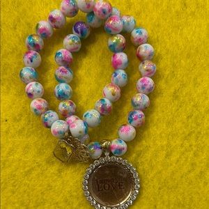 Pink and Blue Beaded Bracelet with Intricate Pendant